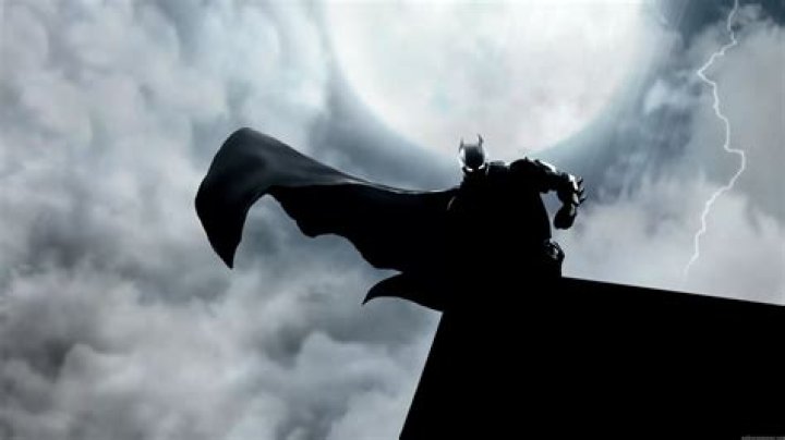Batman standing on rooftop